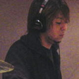 西川貴広